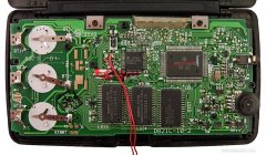 Main electronic card. Hitachi processor, Nec program ROM and 2 x Sony 128 KB memory chips. The small square chip is probably the graphic display controller.